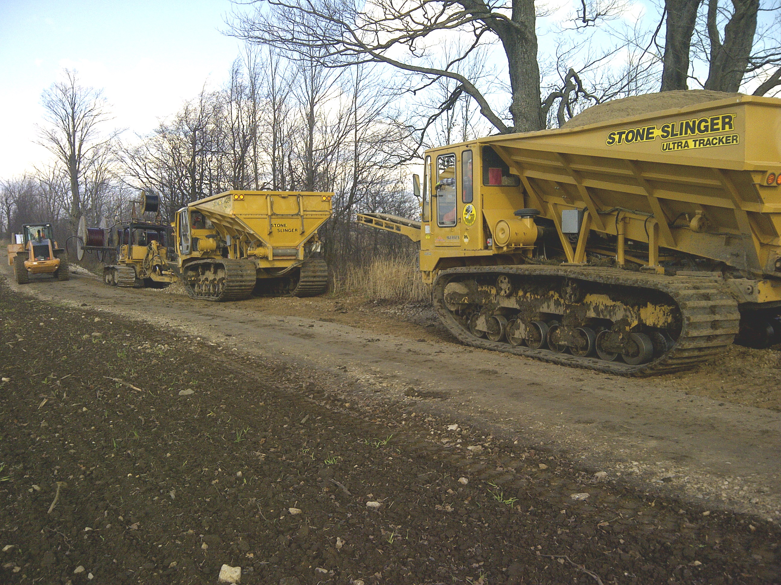 The Morooka 3300 carrier equipped with a Stone Slinger body enables