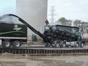 Landsource Organix purchased its custom Stone Slinger to reduce the reloading cost of its blower truck fleet.