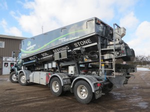 The custom-built 40 yard Stone Slinger truck was developed as a delivery system to support Landsource Organix' fleet of blower trucks.