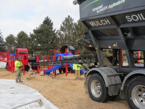 Operating the Stone Slinger with a remote control pack allows the operator to place wood fibre more efficiently and with greater safety.