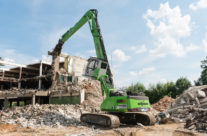 Multi-Tasking SENNEBOGEN 830 E Demolition Machine Takes Down Vacant Fortress In Regensburg